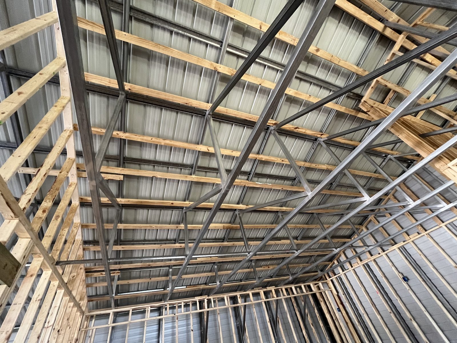 Steel and wood roof framing on a commercial structure